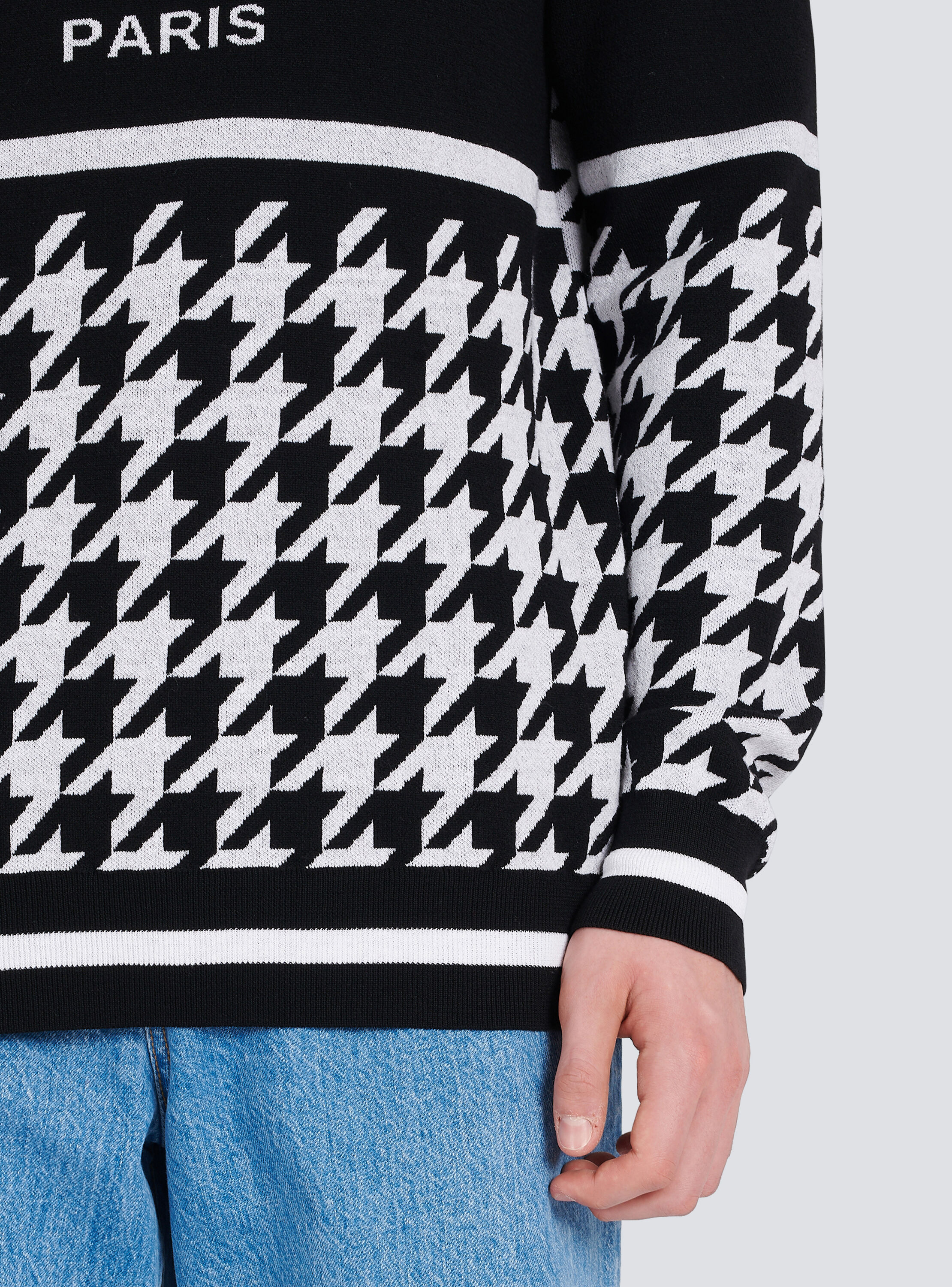 Houndstooth-patterned wool sweater 